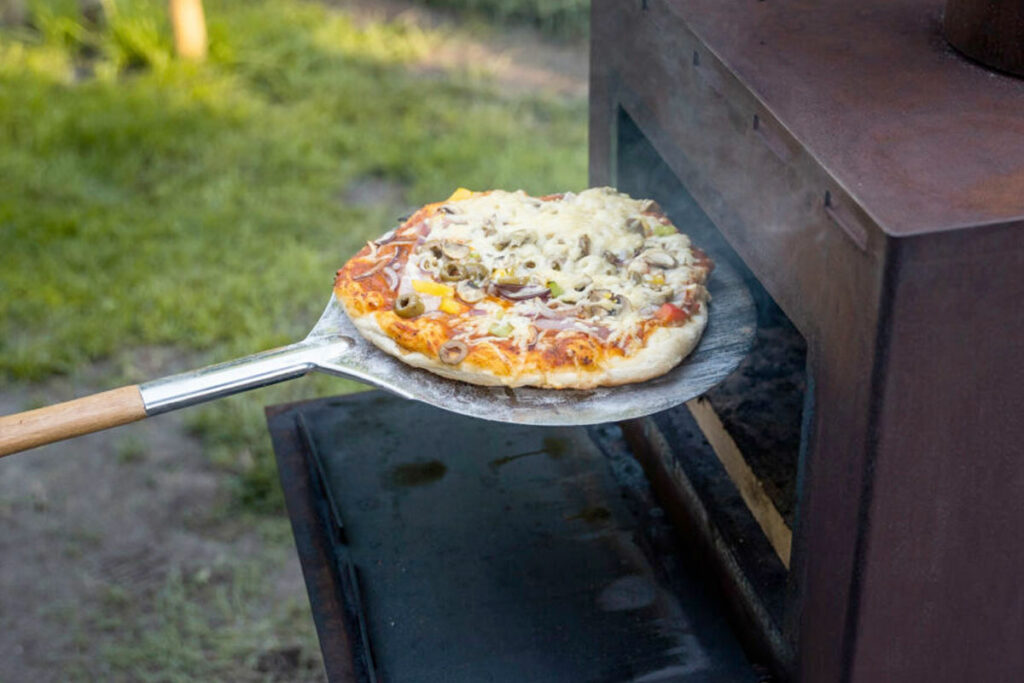 Buitenkachel met pizzaoven kopen
